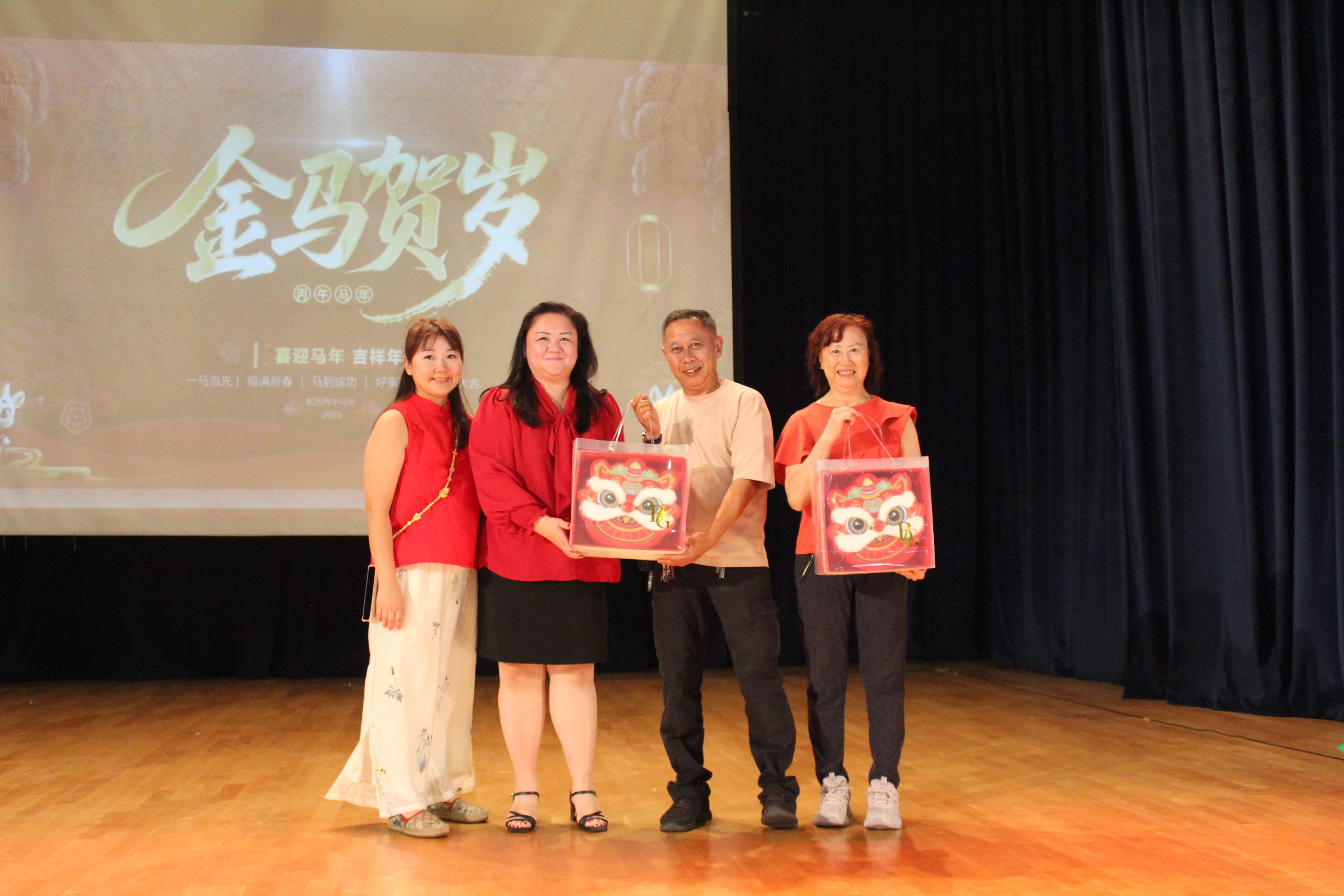 School Principal presenting gift to GOH